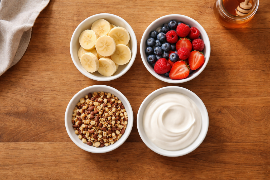  ingredients for fruit and nut morning bowl including fruit and chopped nuts
